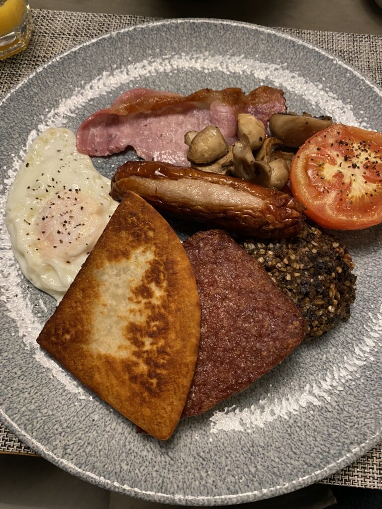 plate with Scottish breakfast food on it